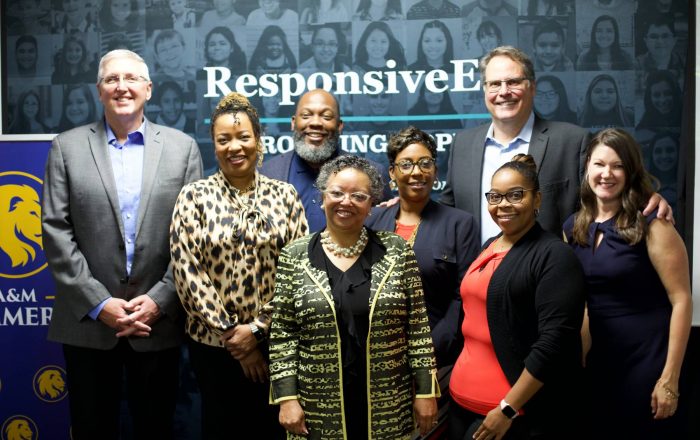 A group of faculty posing for a picture.