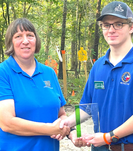 Caleb Painter receives his award