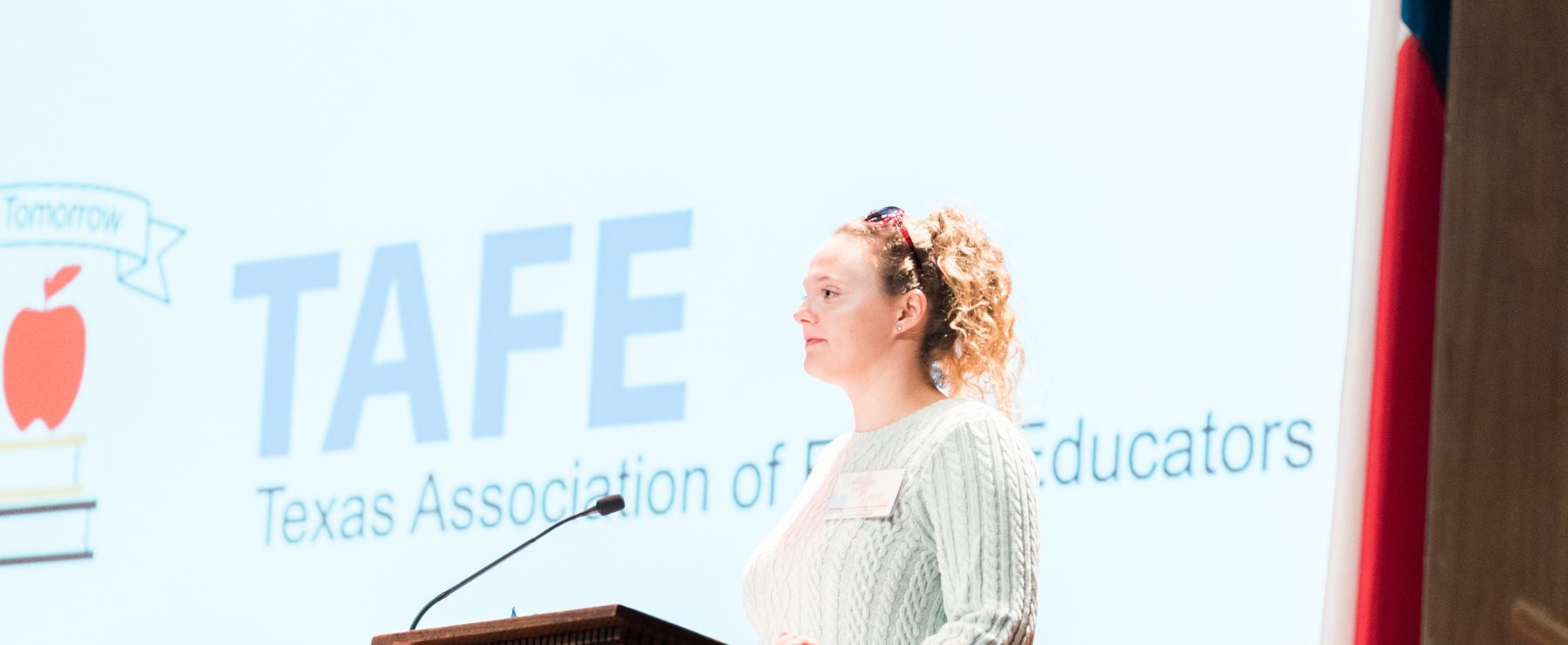 TAFE chapter president Caitlynn Moniz address conference crowd