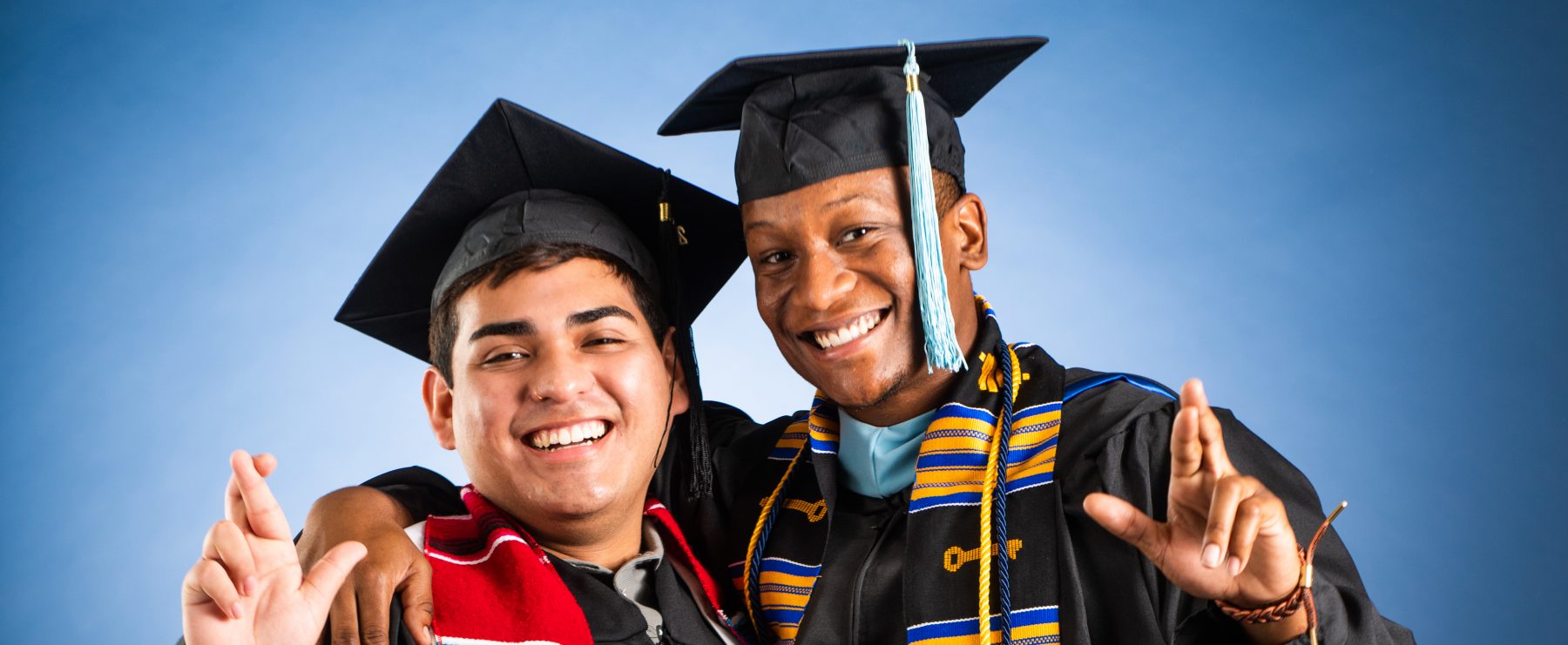 Two TAMUC minority graduates