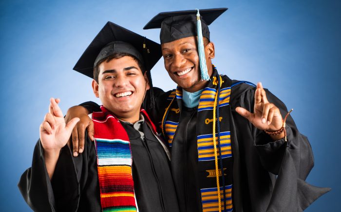 Two TAMUC minority graduates