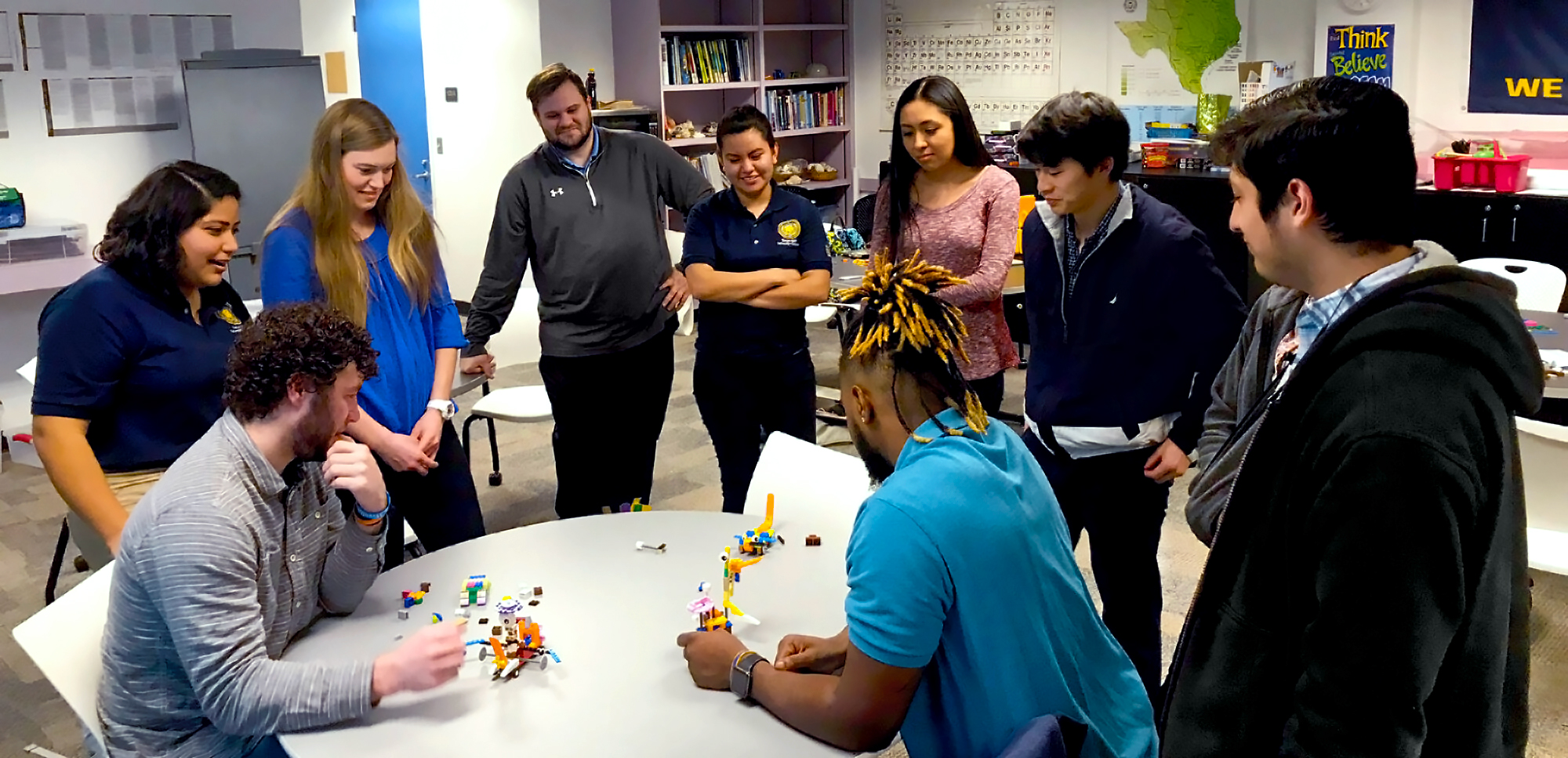 Group of LeoTeach STEM students practicing using manipulatives.