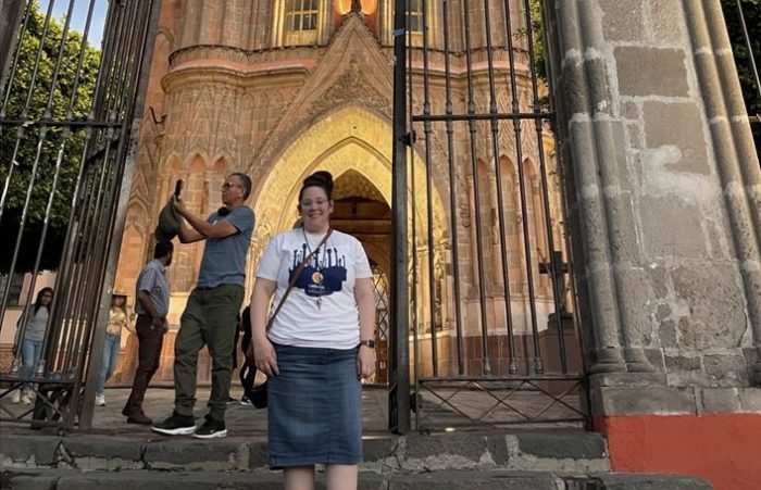 Charity in front of a church.