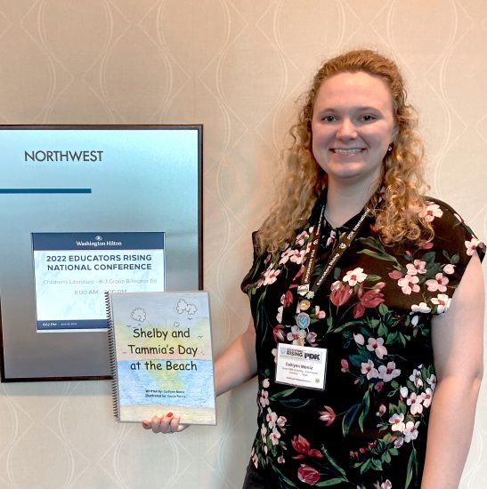 Caitlynn Moniz holding her and Parris's book.