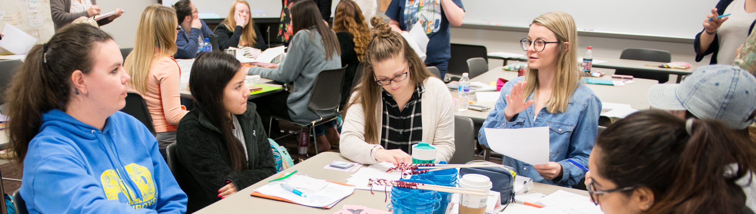 A group of students completing an assignment together. 