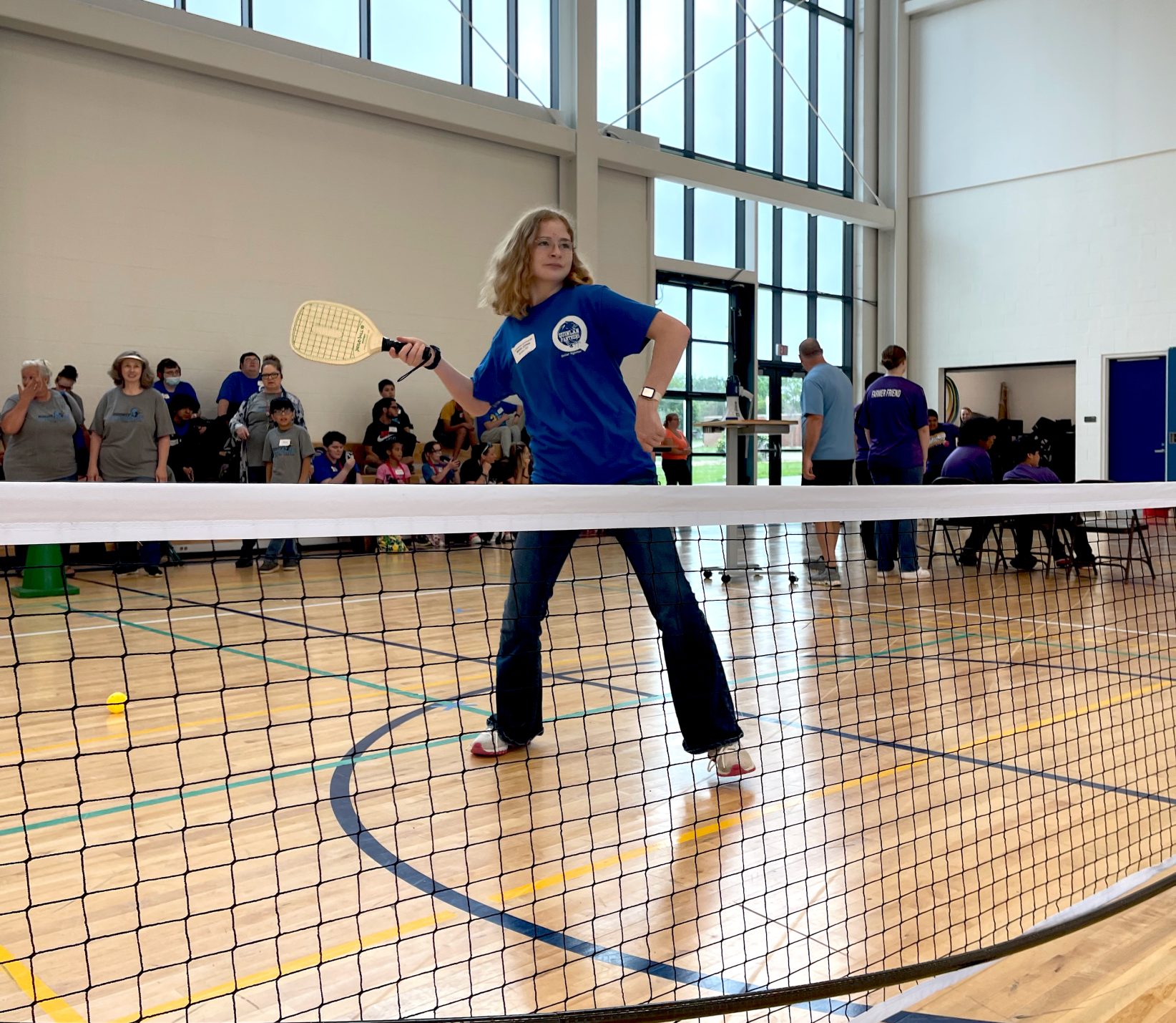 A Special Olympics athlete zeroes in on an incoming ball.