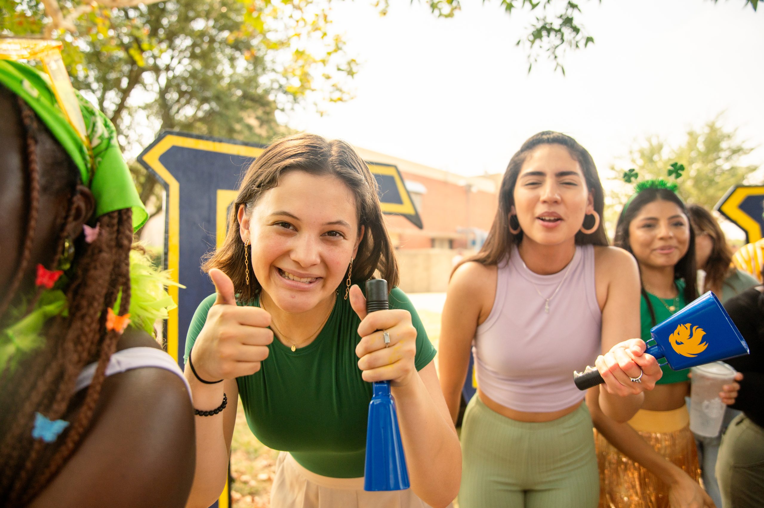 Several female students smiling at the camera