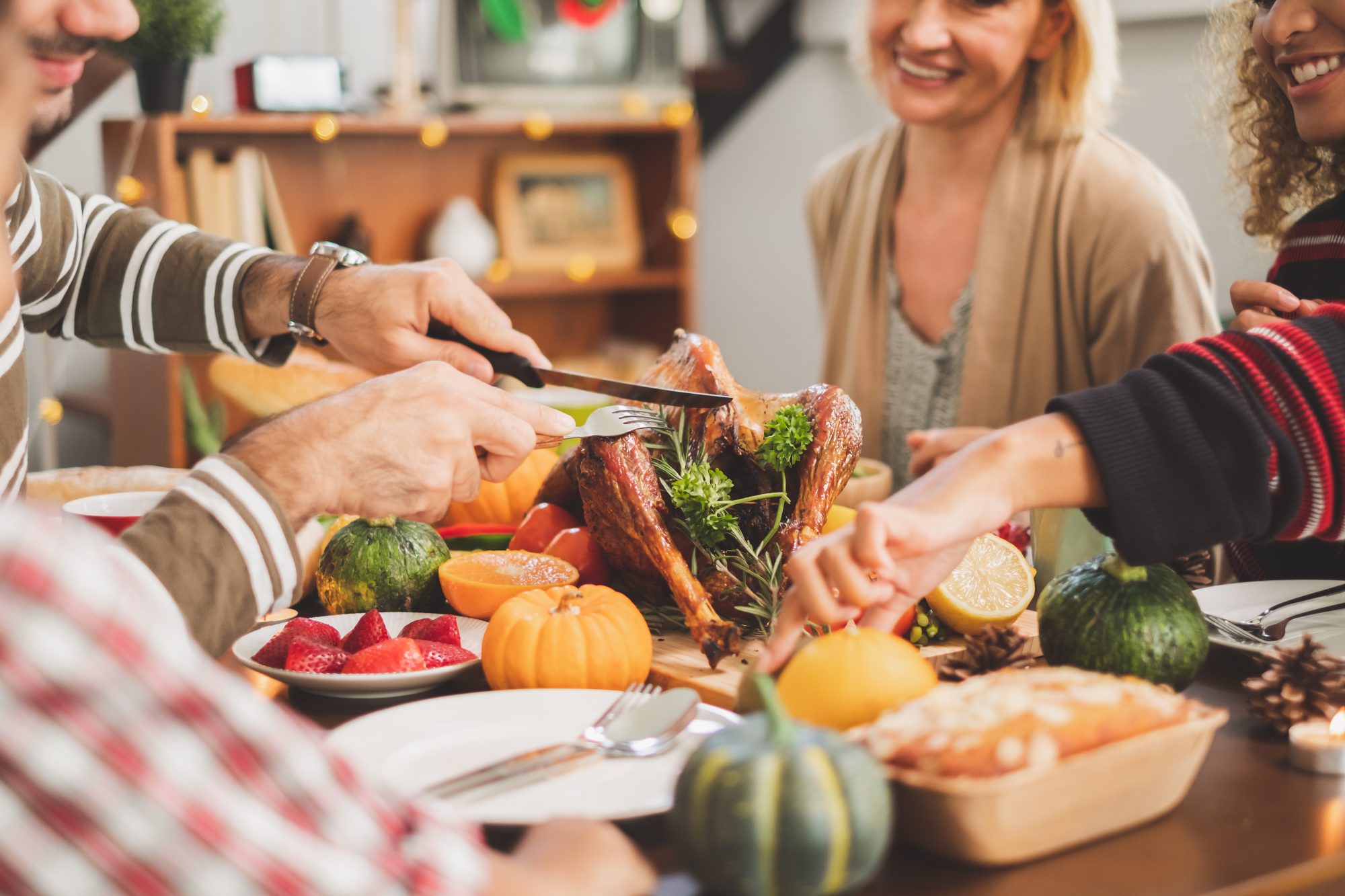 A family gathered around a Thanksgiving meal