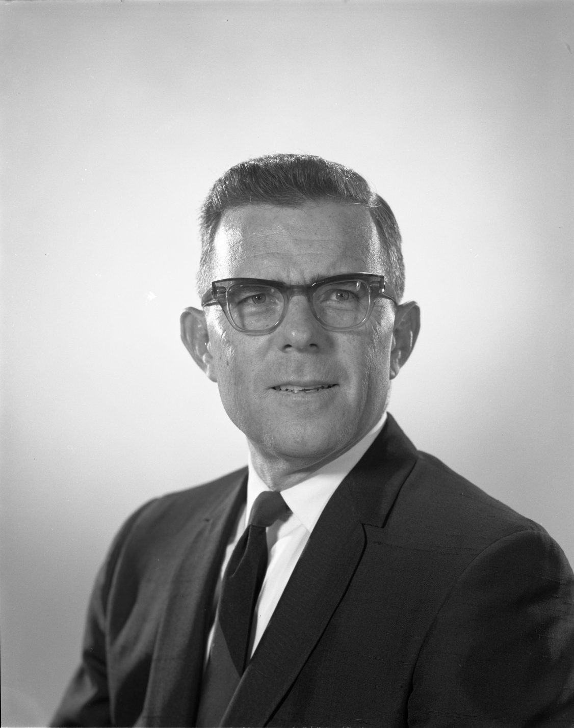 Black and white portrait of President Halladay